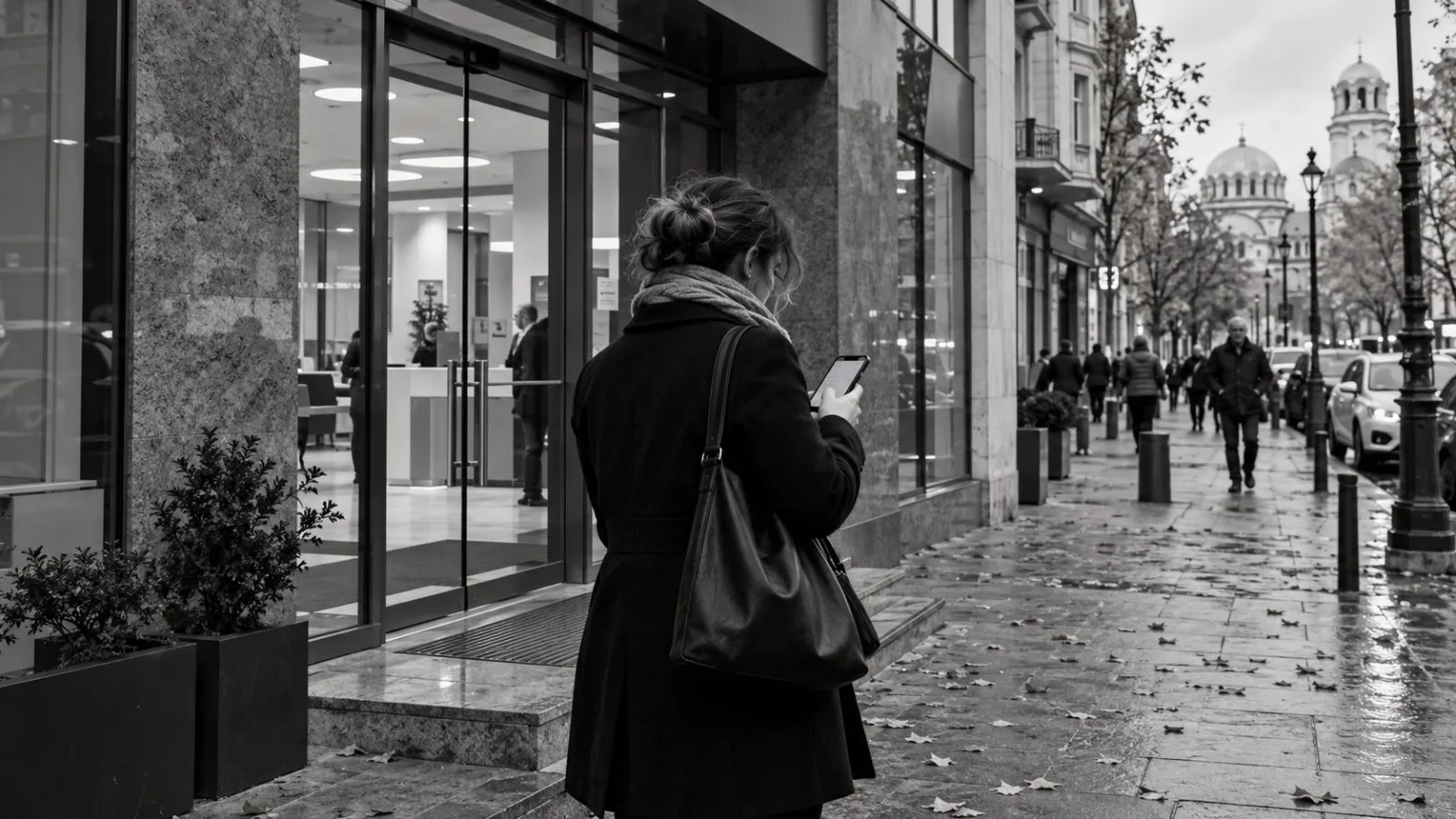 A customer checks a smartphone outside a bank branch in Sofia, Bulgaria. (AI-generated image / EconoTimes)