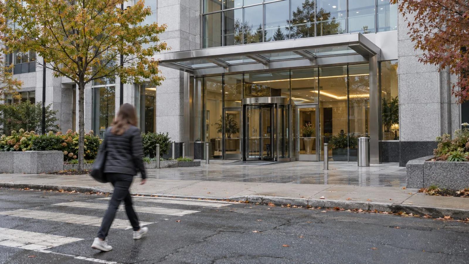 A pedestrian passes an office building on Connecticut Avenue in Norwalk, Connecticut. (AI-generated image / EconoTimes)