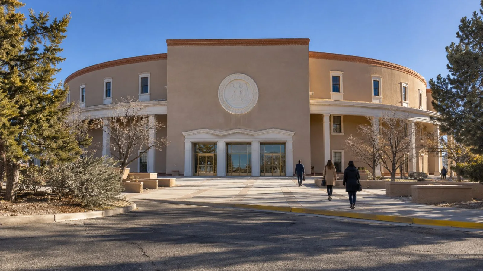The New Mexico State Capitol stands beneath clear skies in Santa Fe. (AI-generated image / EconoTimes)