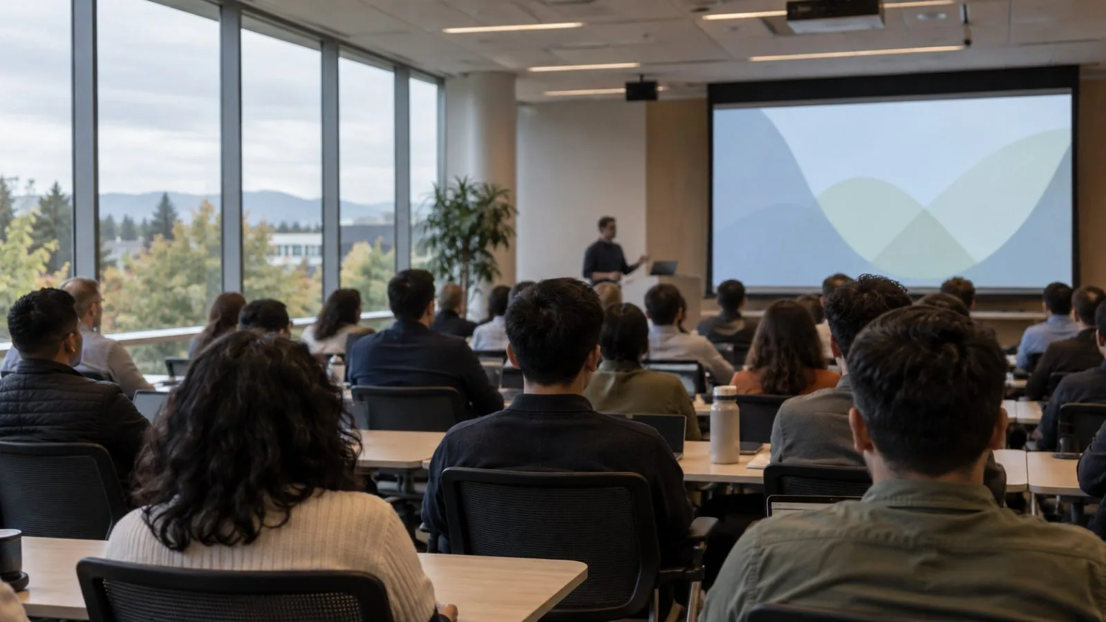 Attendees face a presenter at Microsoft's campus in Mountain View, California. (AI-generated image / EconoTimes)