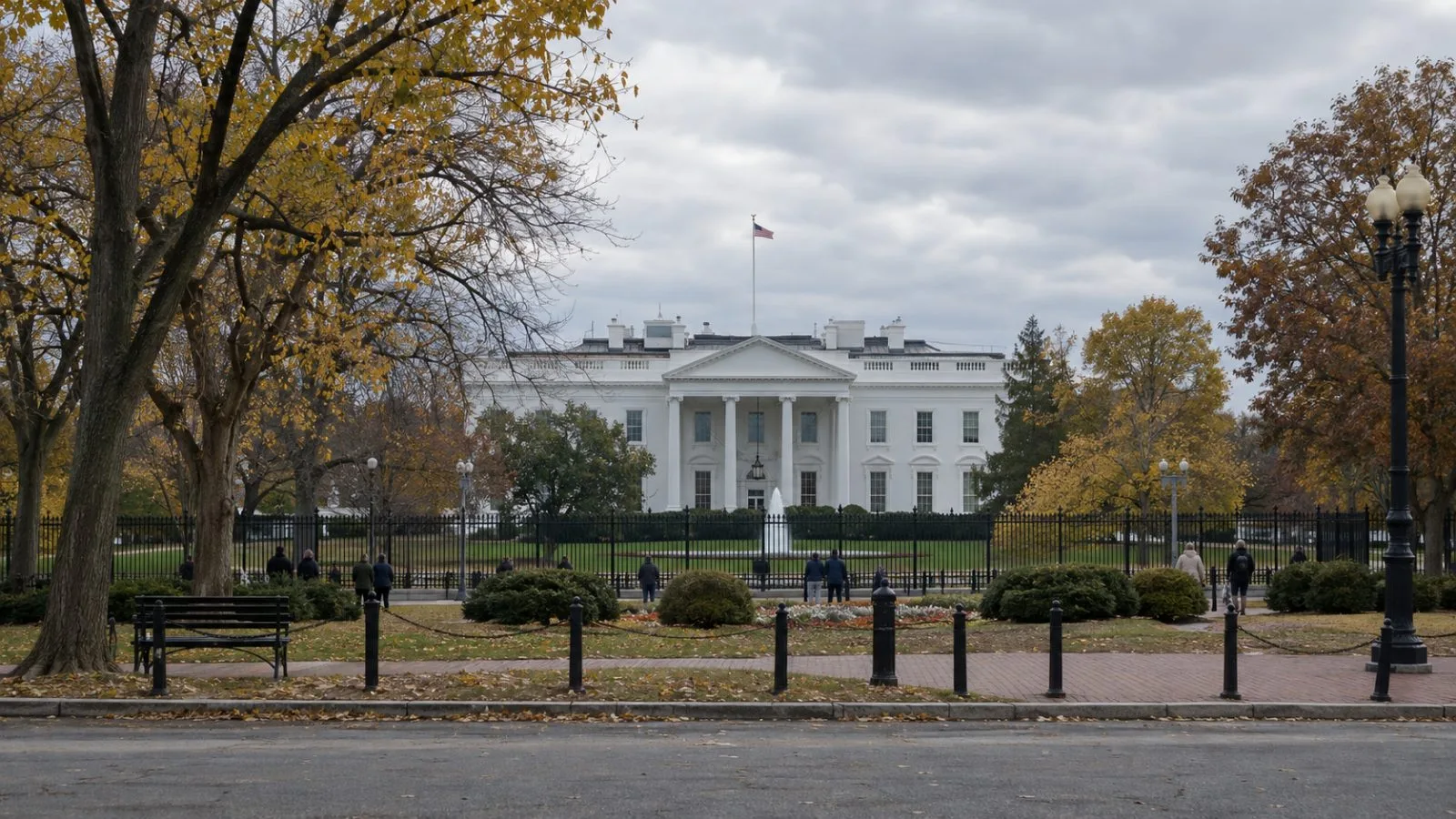 The White House stands behind security fencing in Washington on a cloudy afternoon. (AI-generated image / EconoTimes)