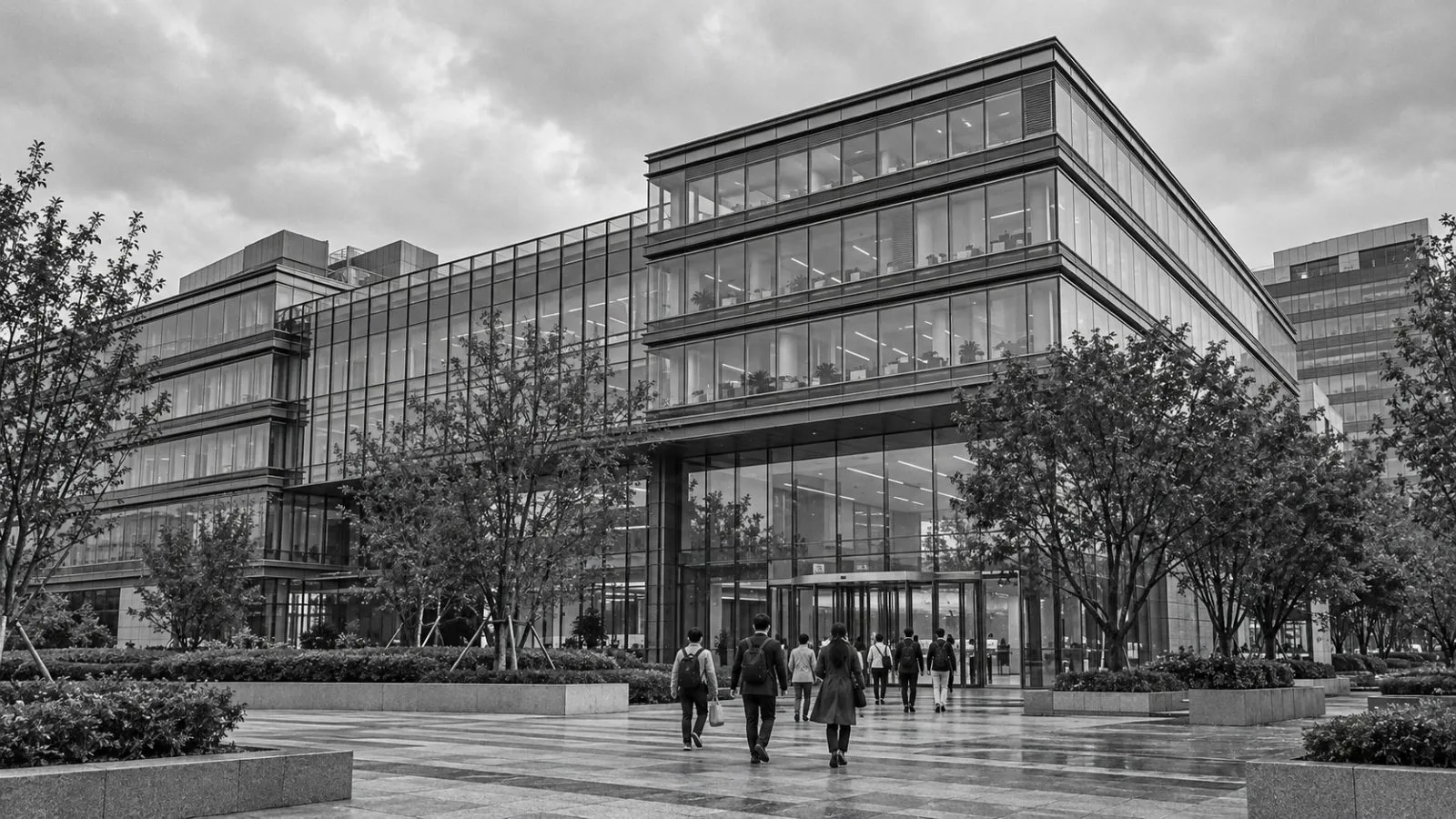 Workers enter ByteDance's headquarters in Beijing's Haidian district on an overcast morning. / EconoTimes.ai
