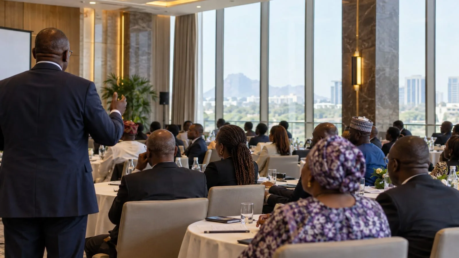 Delegates gather for a business summit at the Transcorp Hilton in Abuja, Nigeria (AI-generated image / EconoTimes)