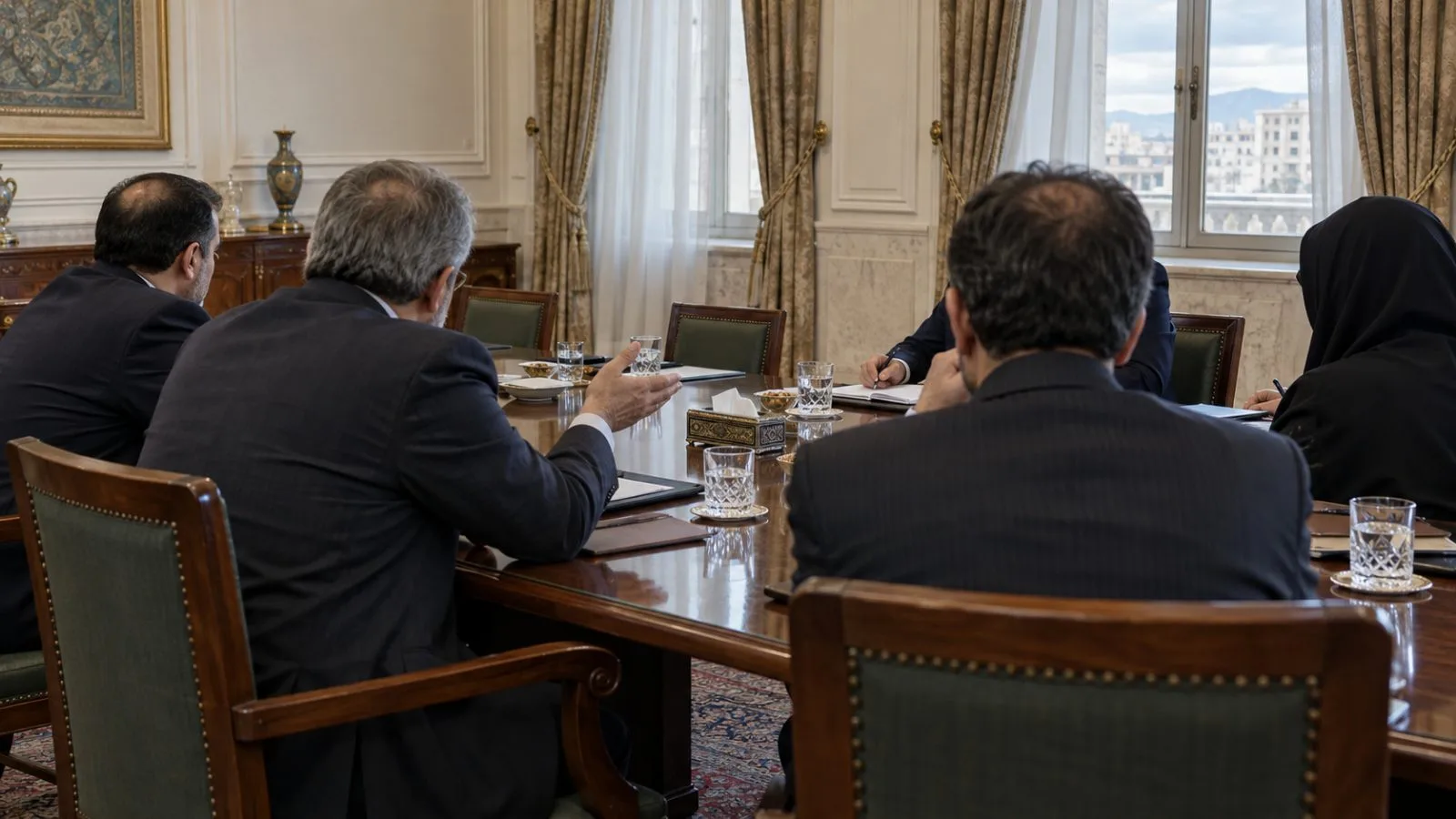 Officials sit across a conference table inside a government meeting room in Tehran (AI-generated image / EconoTimes)