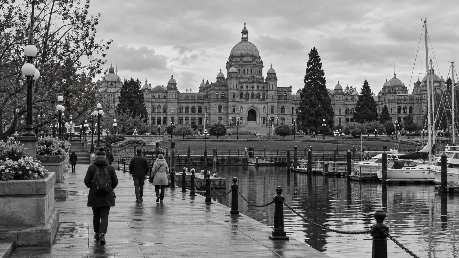 The British Columbia Parliament Buildings stand beside the Inner Harbour in Victoria. (AI-generated image / EconoTimes)