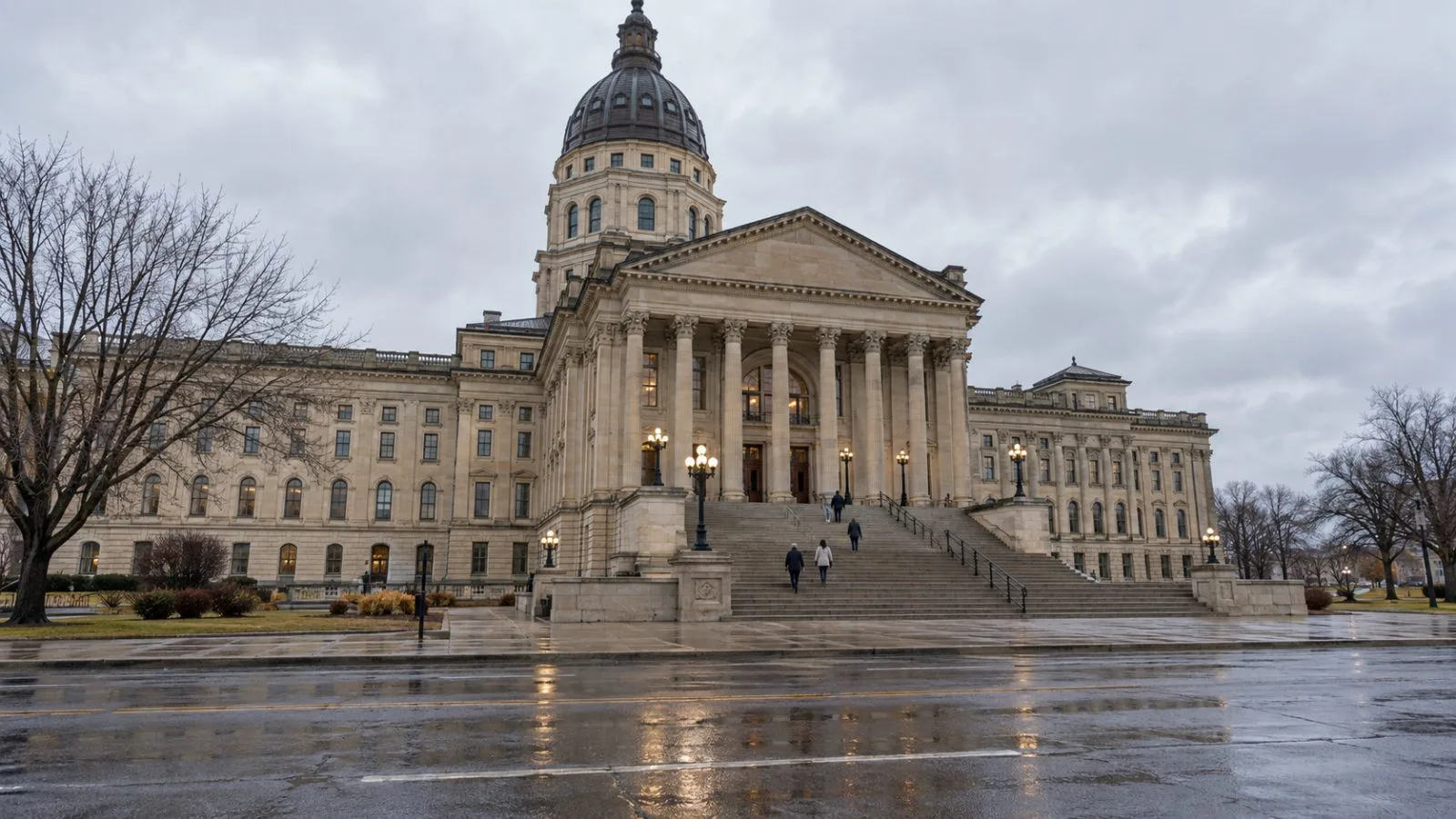 Visitors approach the Kansas State Capitol in Topeka beneath an overcast afternoon sky. (AI-generated image / EconoTimes)