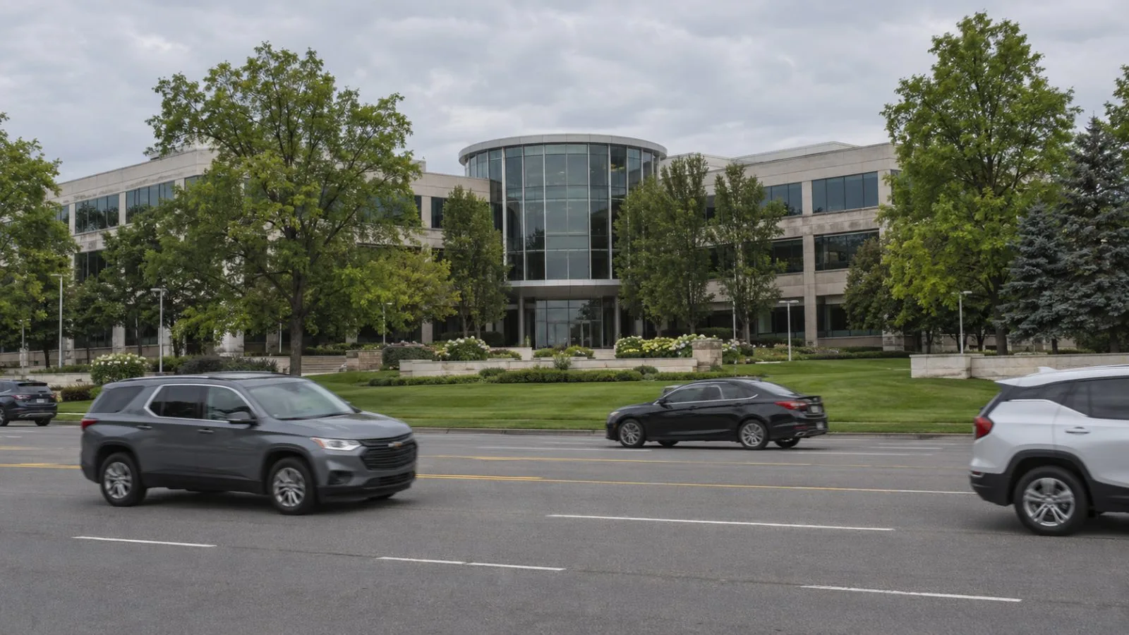 The Penske Automotive Group headquarters stands along Telegraph Road in Bloomfield Hills, Michigan. (AI-generated image / EconoTimes)