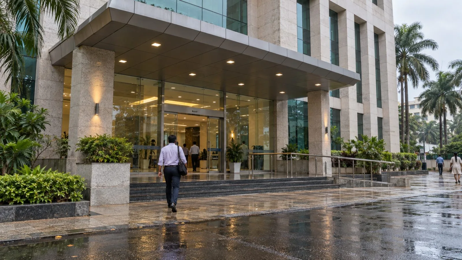 A customer enters Karnataka Bank’s headquarters in Mangaluru, India, on an overcast morning (AI-generated image / EconoTimes)