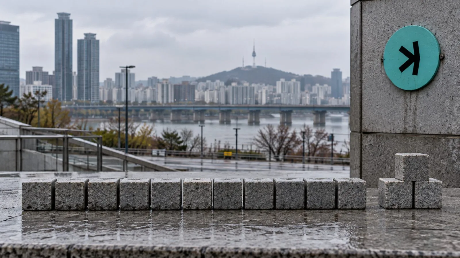 An editorial graphic shows a smaller block stack beside ten cubes in Seoul. / EconoTimes.ai