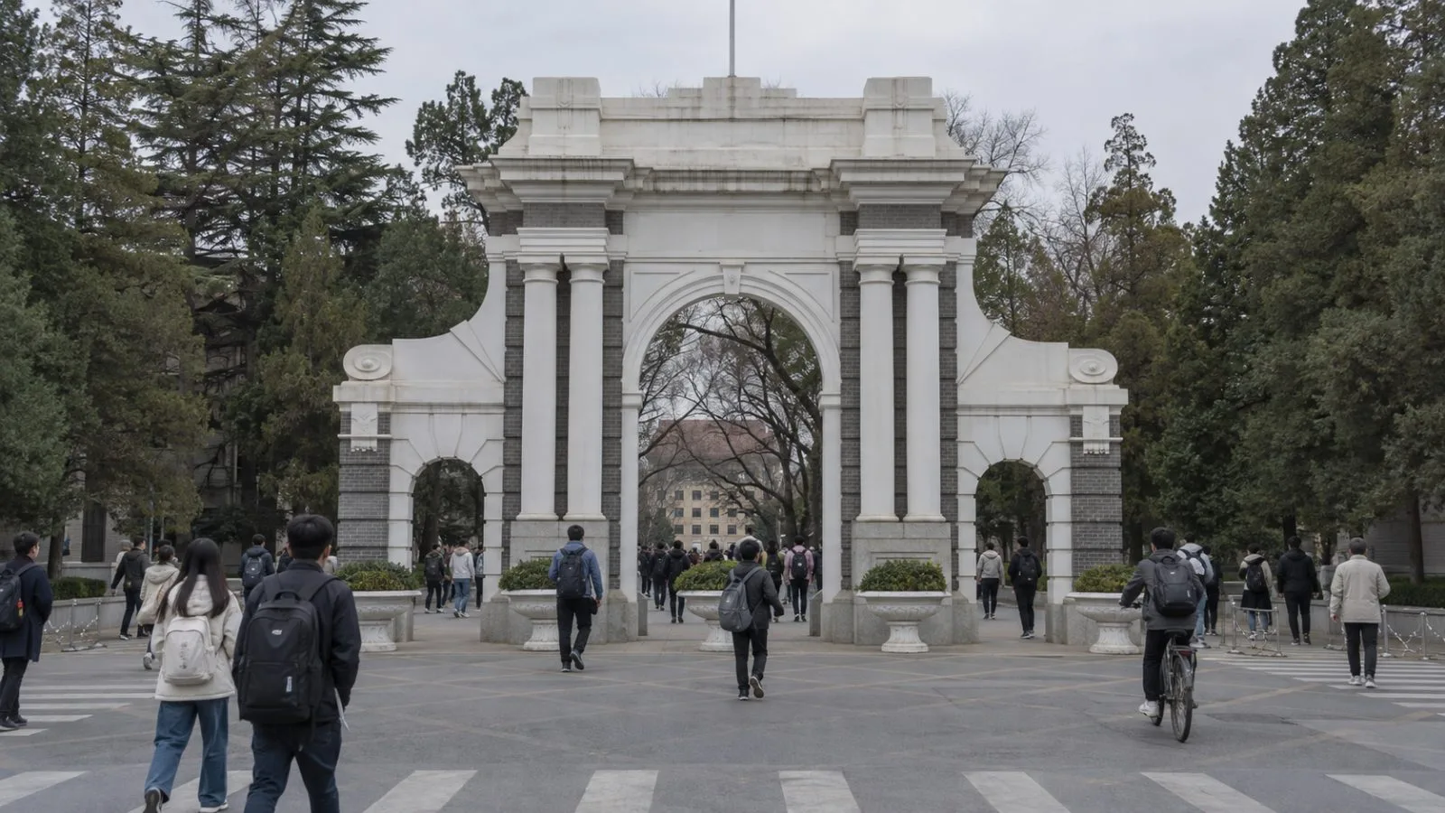 Pedestrians walk through an entrance to Tsinghua University in Beijing, China. (AI-generated image / EconoTimes)
