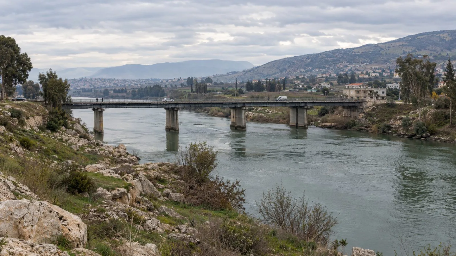 A road bridge crosses the Litani River near Tyre in southern Lebanon. (AI-generated image / EconoTimes)