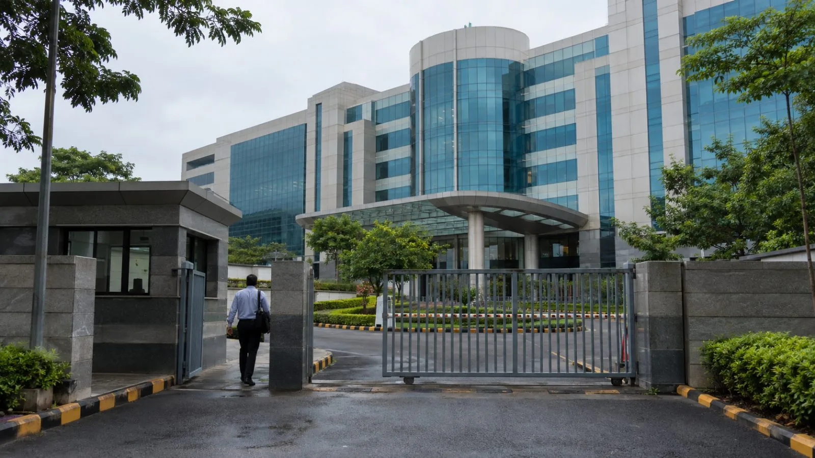 A security gate fronts the insurance regulator’s headquarters in Hyderabad, India. (AI-generated image / EconoTimes)