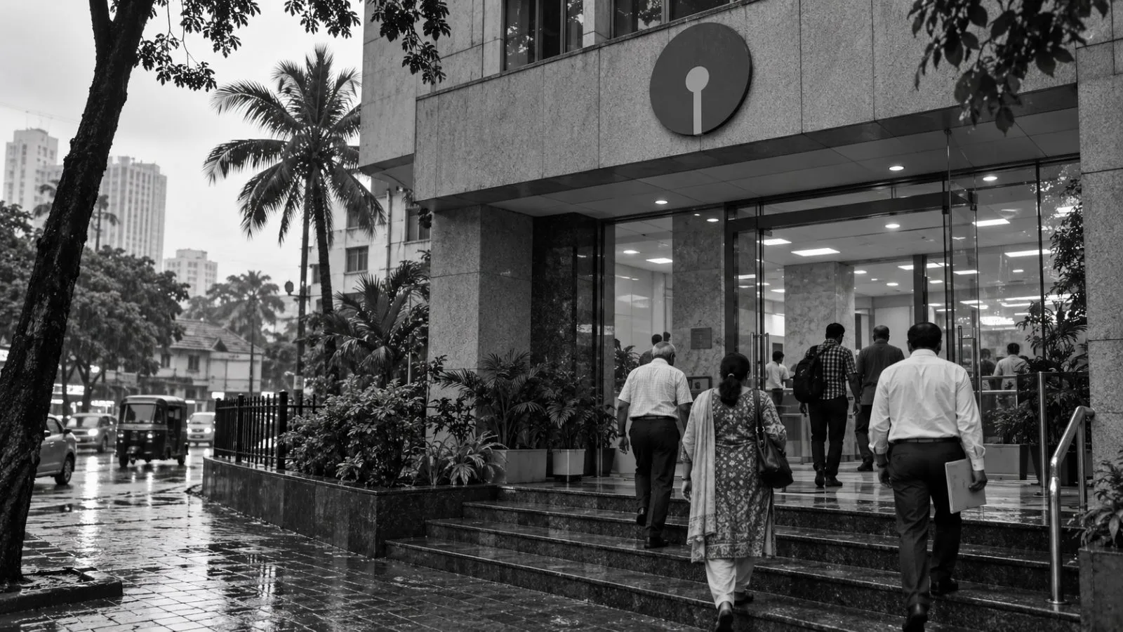 Customers approach a State Bank of India branch in Mumbai on an overcast afternoon. / EconoTimes.ai