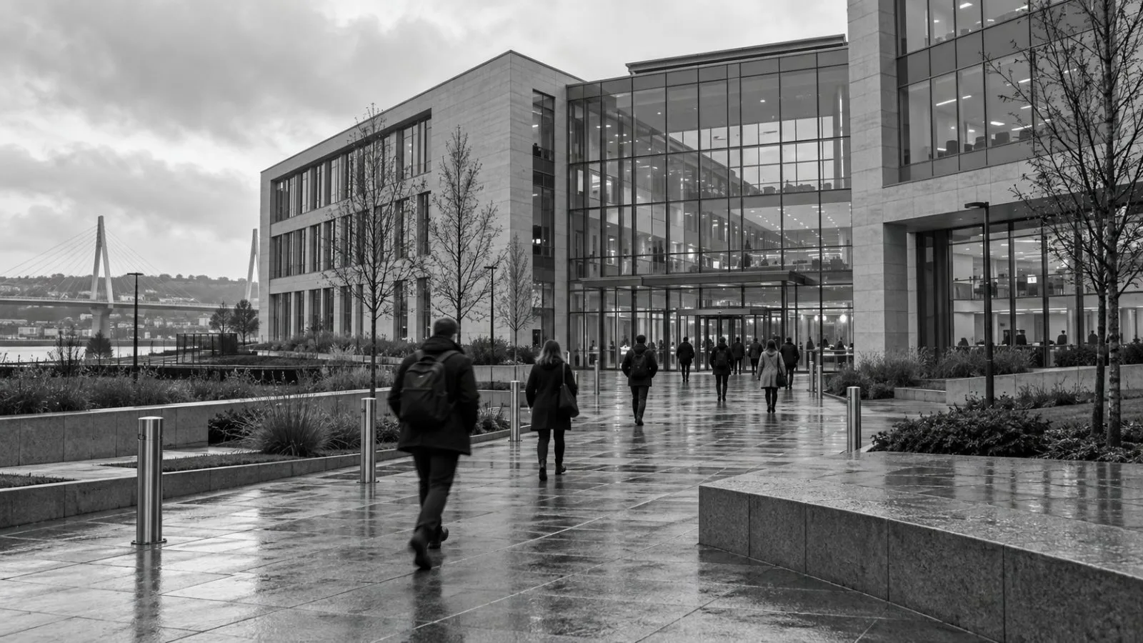Blurred commuters approach the Office for National Statistics campus in Newport, Wales, on an overcast morning. (AI-generated image / EconoTimes)