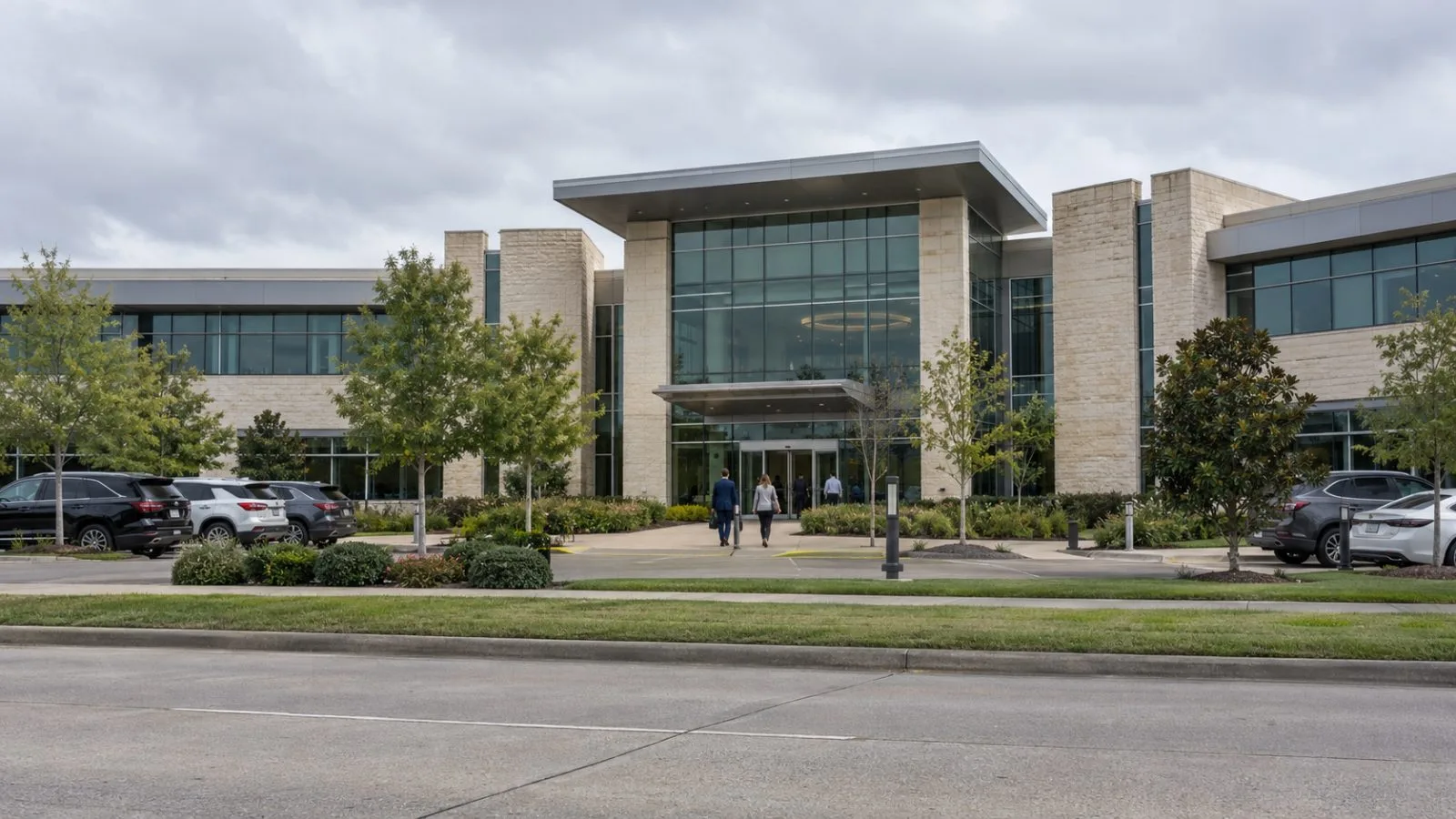 Employees enter Origin Bancorp’s headquarters in Ruston, Louisiana. (AI-generated image / EconoTimes)