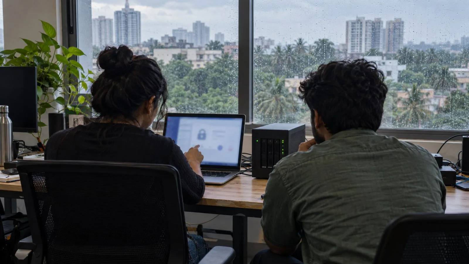 Engineers inspect a private blockchain validator setup in a Bengaluru software workspace. (AI-generated image / EconoTimes)