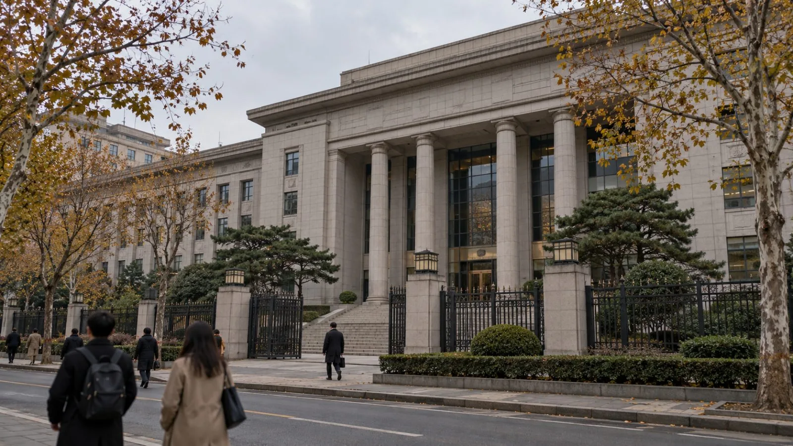 Pedestrians pass a government building in Beijing, China, on an overcast autumn afternoon. (AI-generated image / EconoTimes)