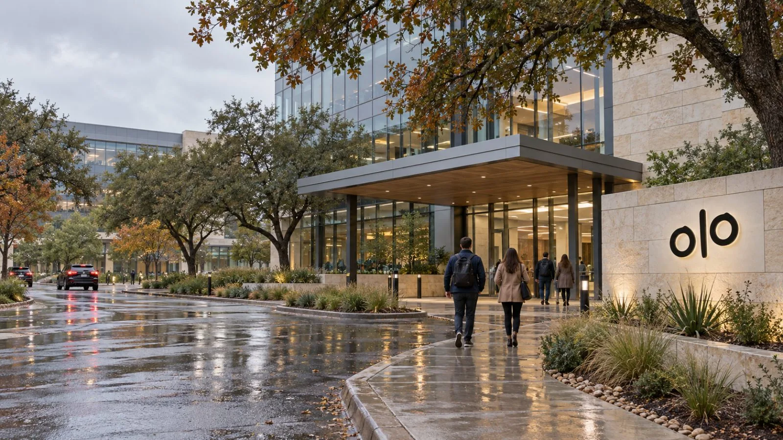 Workers enter an office building at Oracle’s campus in Austin, Texas. / EconoTimes.ai
