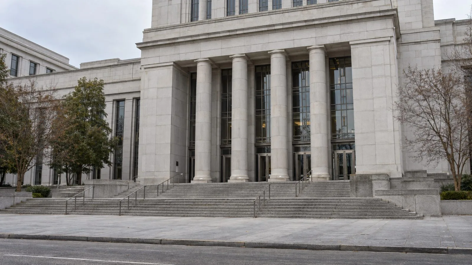 The federal courthouse stands on a Sacramento street beneath a gray morning sky. (AI-generated image / EconoTimes)