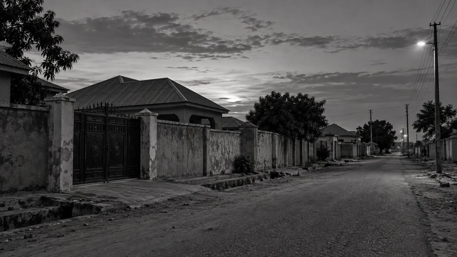 A residential home stands along a quiet street in Dutsin-Ma, Katsina State, Nigeria. (AI-generated image / EconoTimes)