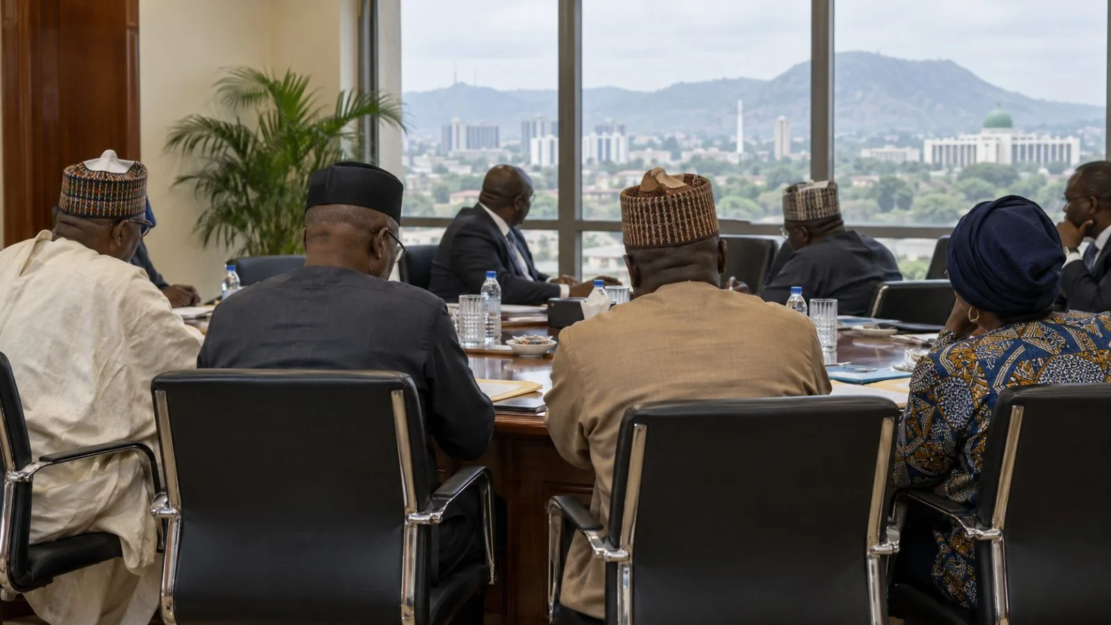 Officials sit for labor talks in a government meeting room in Abuja, Nigeria. (AI-generated image / EconoTimes)