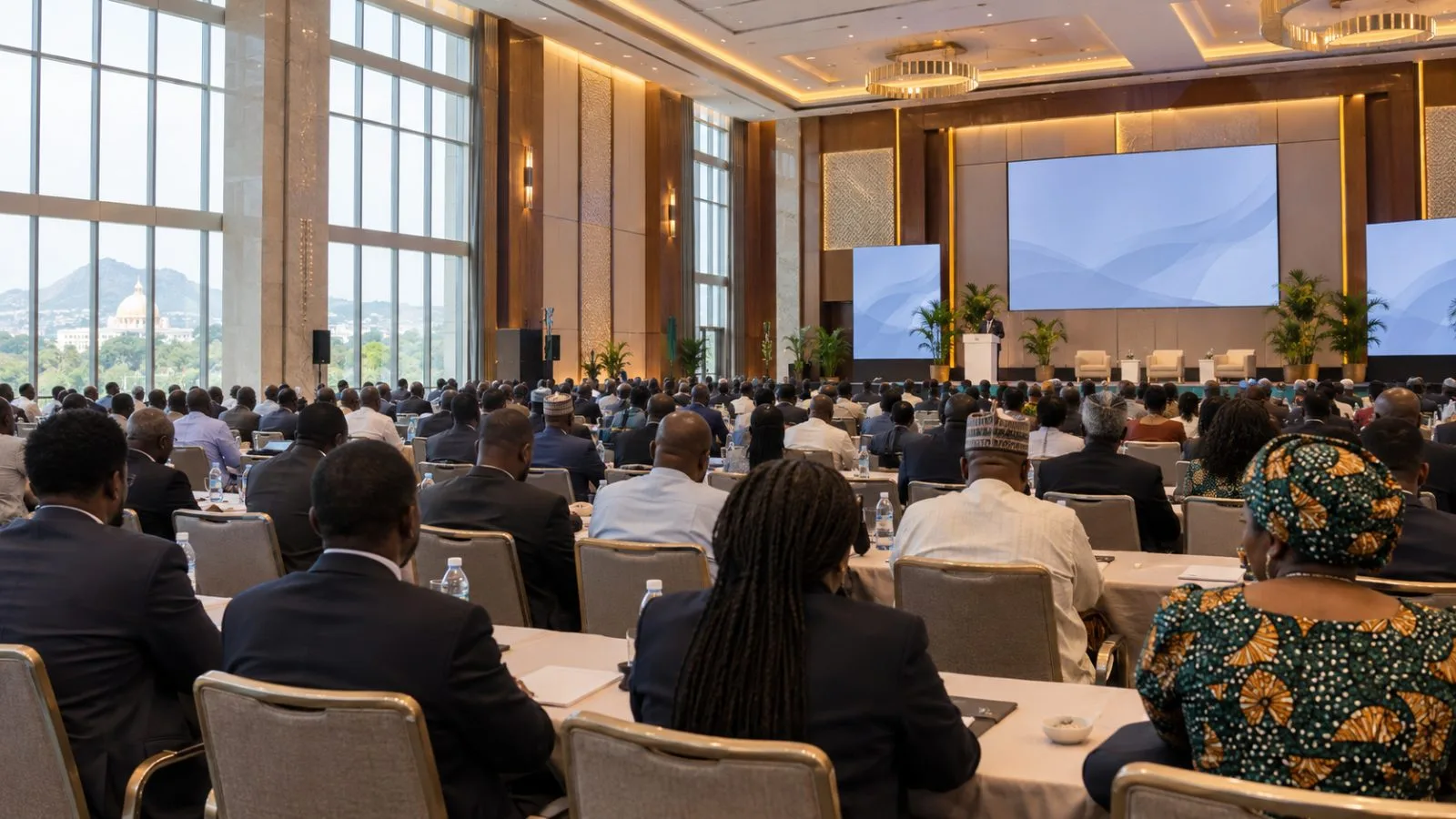 Delegates listen during an economic summit in Abuja, Nigeria. (AI-generated image / EconoTimes)