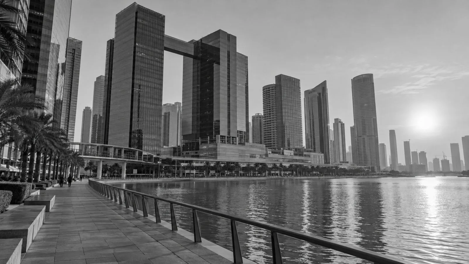 Glass office towers line the waterfront in Abu Dhabi’s Al Maryah Island financial district (AI-generated image / EconoTimes)