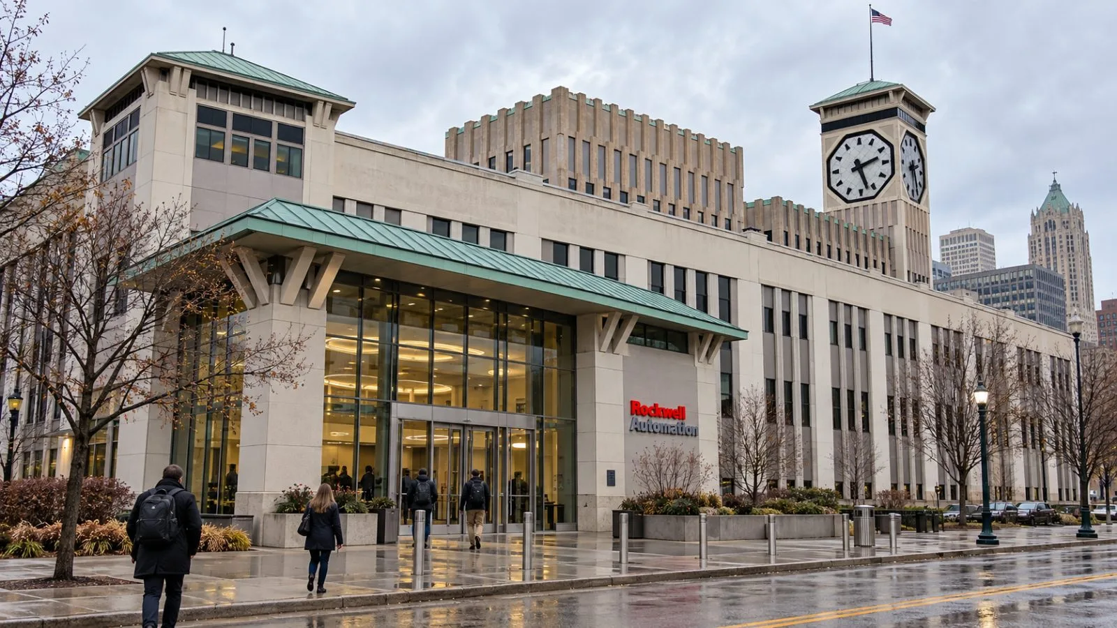 Staff enter Rockwell Automation's headquarters in Milwaukee on an overcast afternoon. / EconoTimes.ai