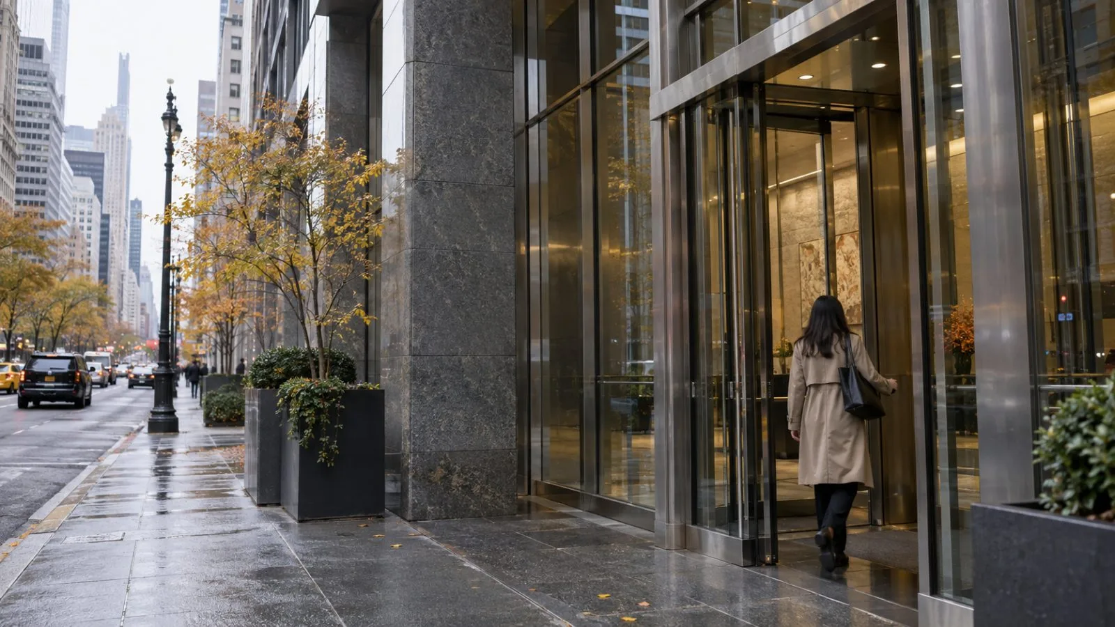 Pedestrians pass the entrance to 100 Park Avenue in Midtown Manhattan on an autumn morning. (AI-generated image / EconoTimes)