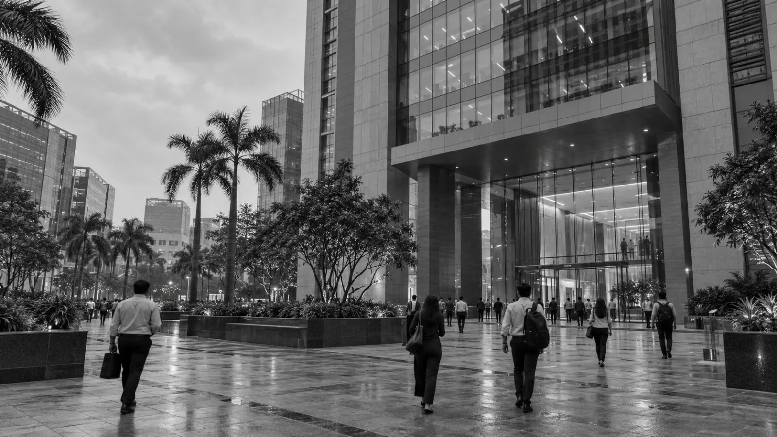 Office workers cross the entrance plaza at Athena Towers in Mumbai’s Mindspace business district. (AI-generated image / EconoTimes)