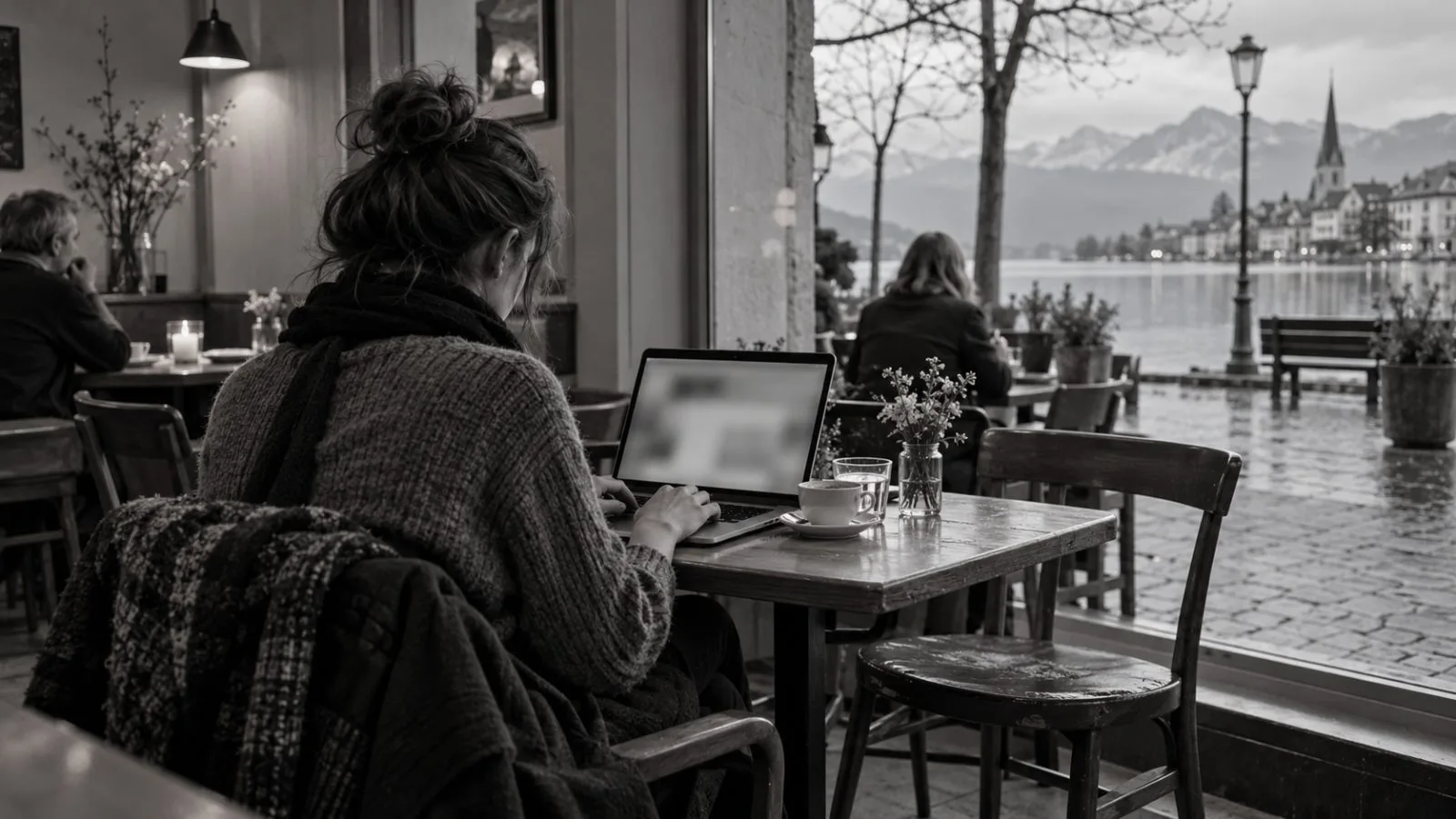 An anonymous user works on a laptop in a café in Zug, Switzerland. (AI-generated image / EconoTimes)