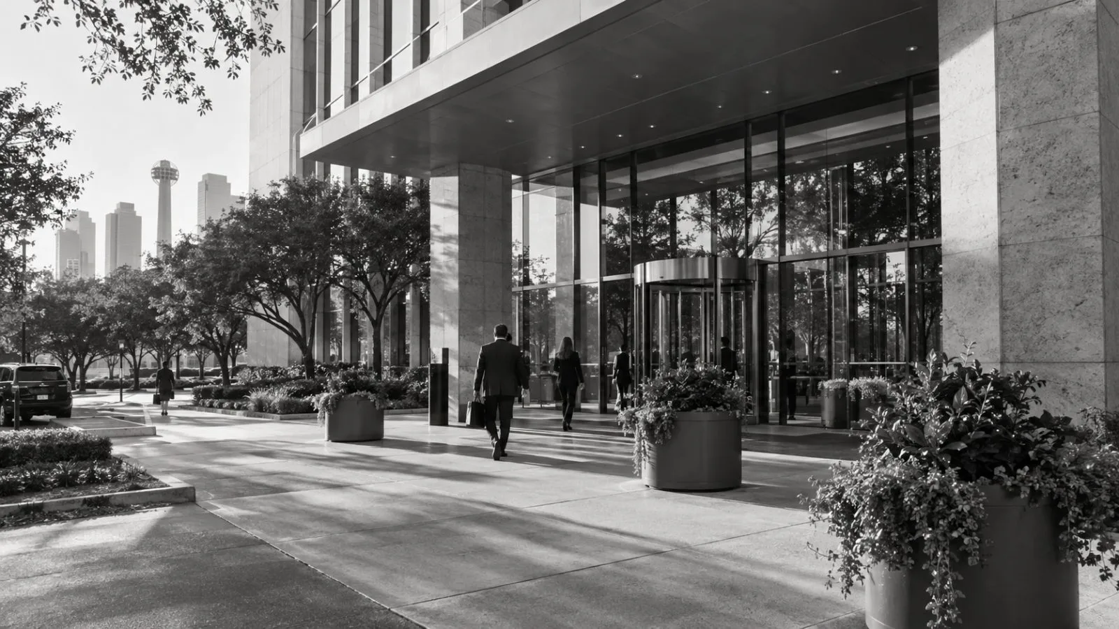 The office entrance at 8333 Douglas Avenue sits in afternoon sun in Dallas, Texas. (AI-generated image / EconoTimes)