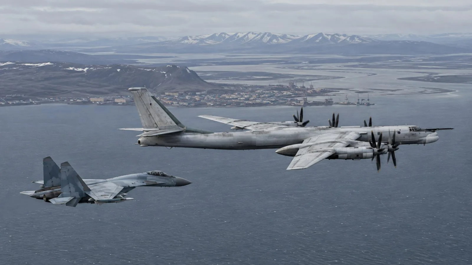 A bomber and fighter jet fly above the Bering Sea near Russia. (AI-generated image / EconoTimes)