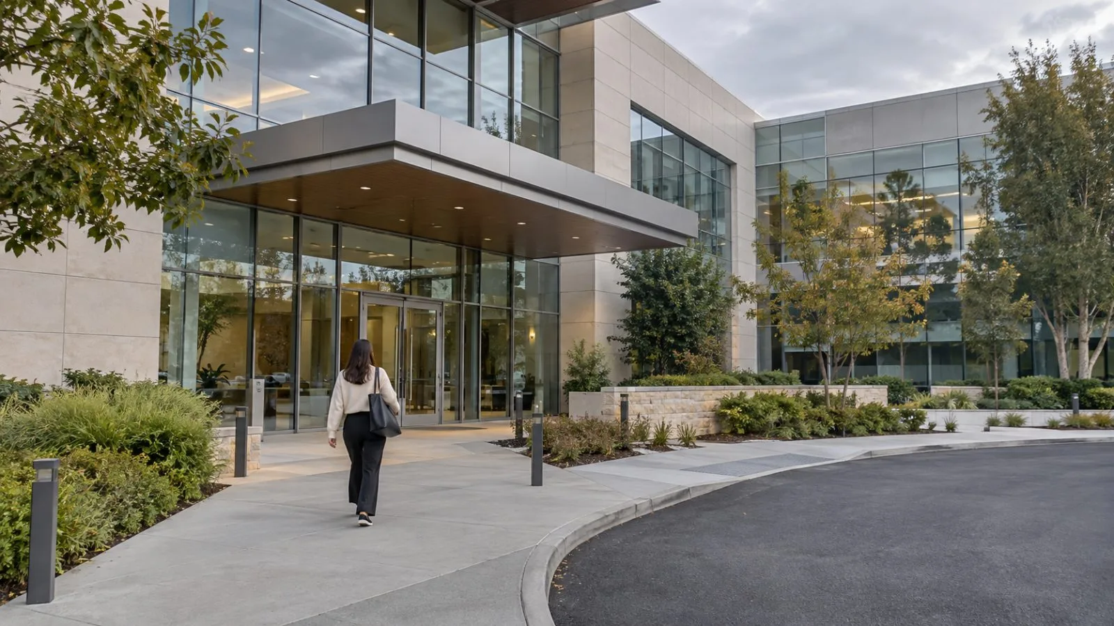 An employee approaches an office building in San Mateo, California, near Roblox’s headquarters. (AI-generated image / EconoTimes)
