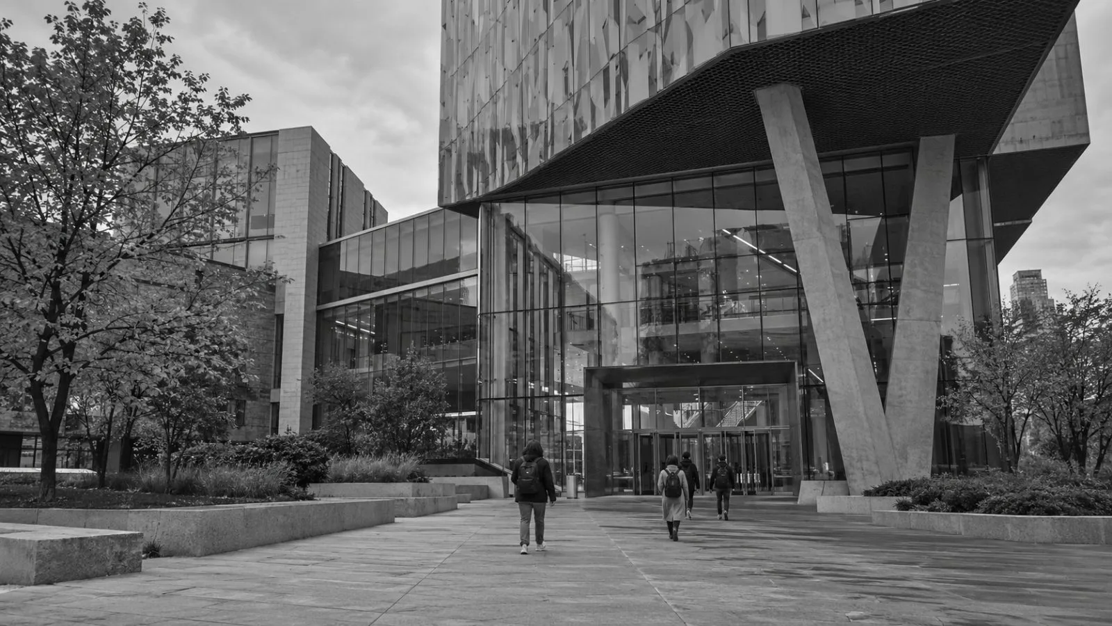 Visitors walk toward the Schwartz Reisman Innovation Campus in Toronto, Canada. (AI-generated image / EconoTimes)