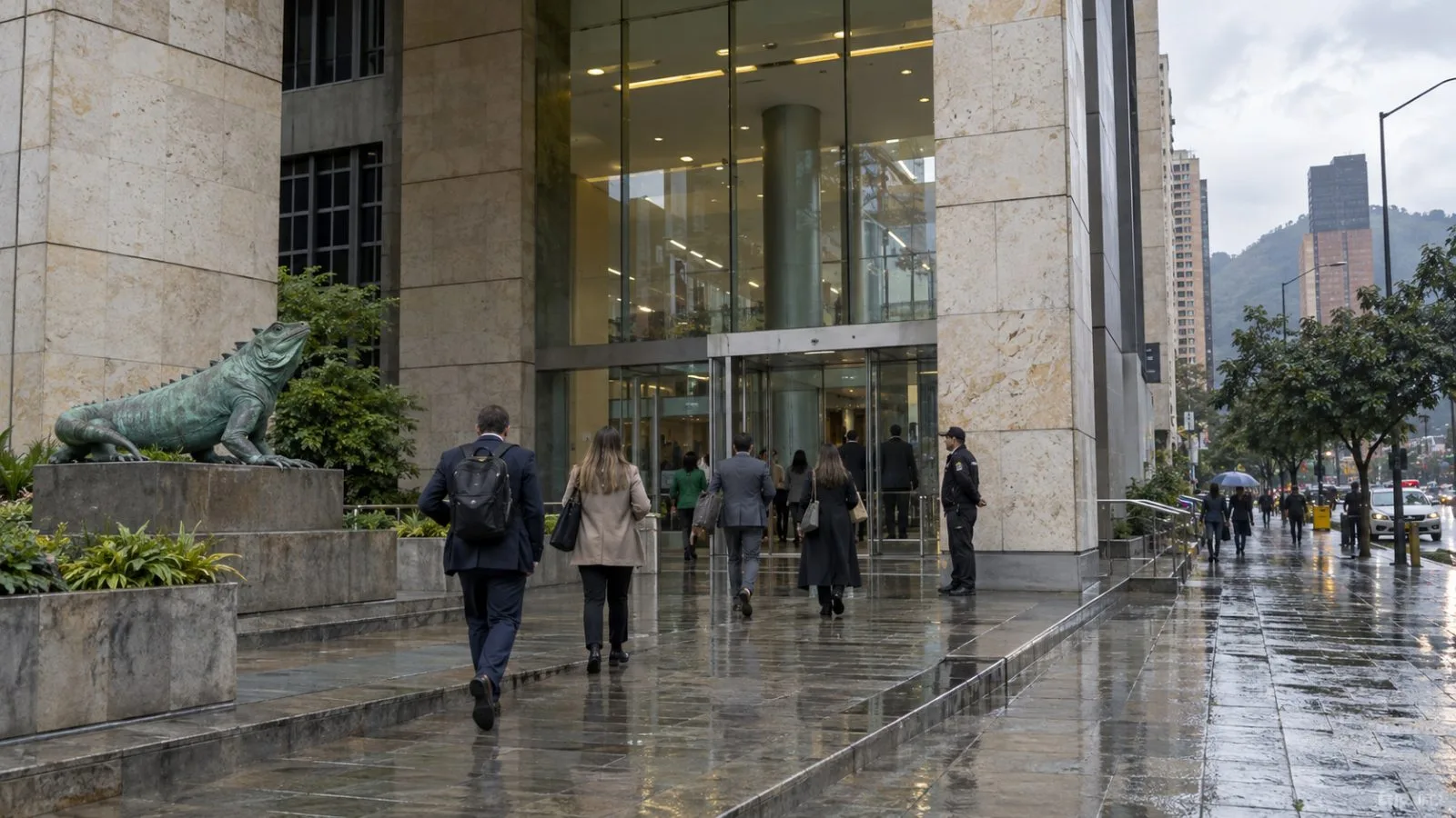 Employees enter Ecopetrol’s headquarters in Bogotá, Colombia, on a rain-darkened afternoon. (AI-generated image / EconoTimes)