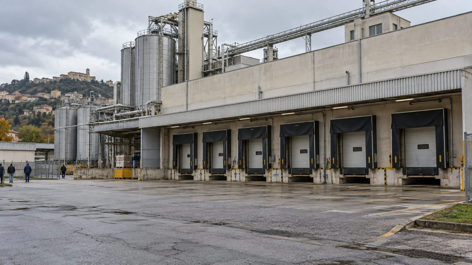 Empty delivery bays stand outside a pasta plant in Benevento, Italy. (AI-generated image / EconoTimes)