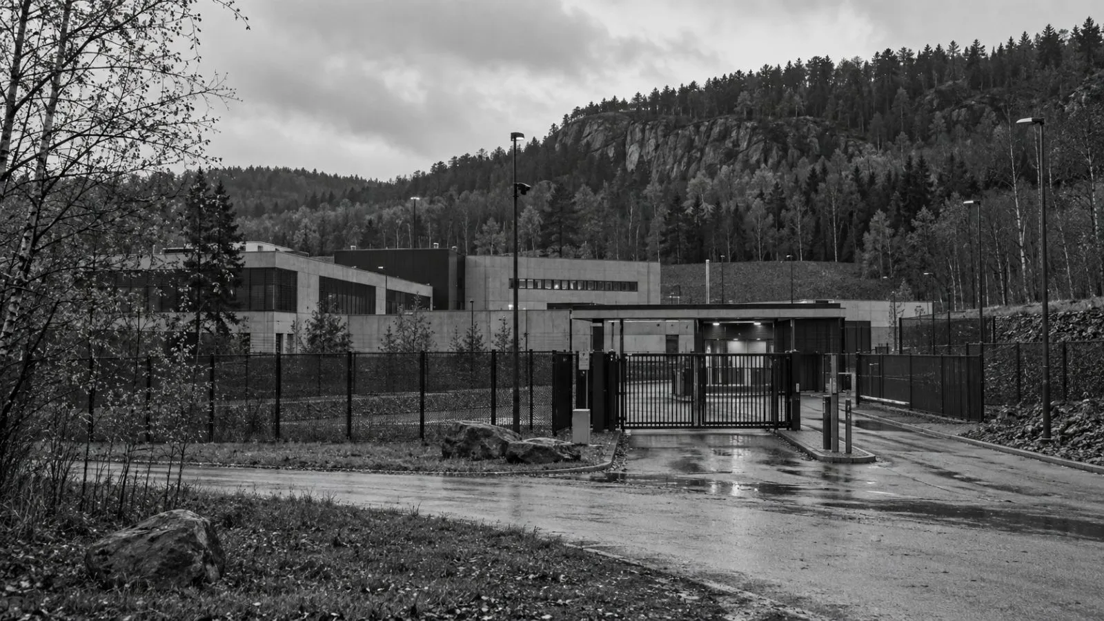 A security gate marks the Norwegian National Security Authority compound in Kolsås, Bærum. (AI-generated image / EconoTimes)
