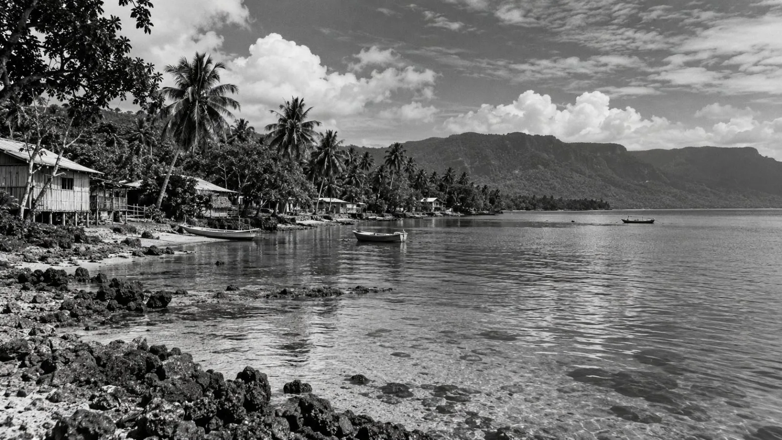 Coastal homes and palms line the shoreline at Port-Olry on Vanuatu’s Espiritu Santo island. (AI-generated image / EconoTimes)