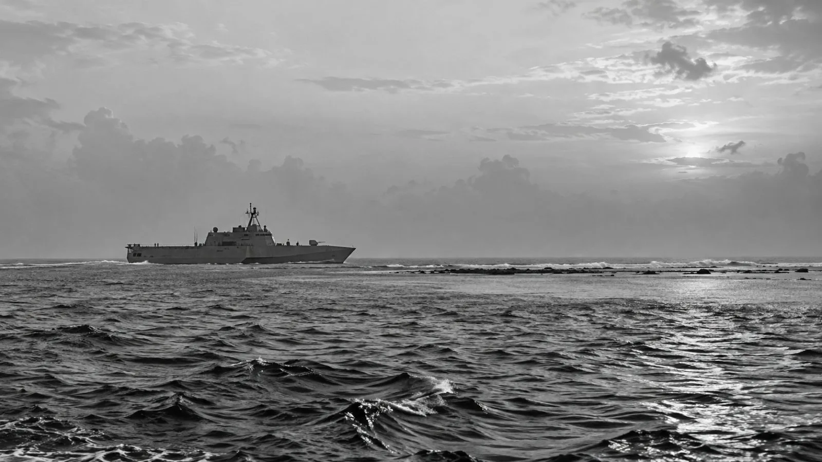 A naval ship crosses waters near Sabina Shoal in the South China Sea. (AI-generated image / EconoTimes)