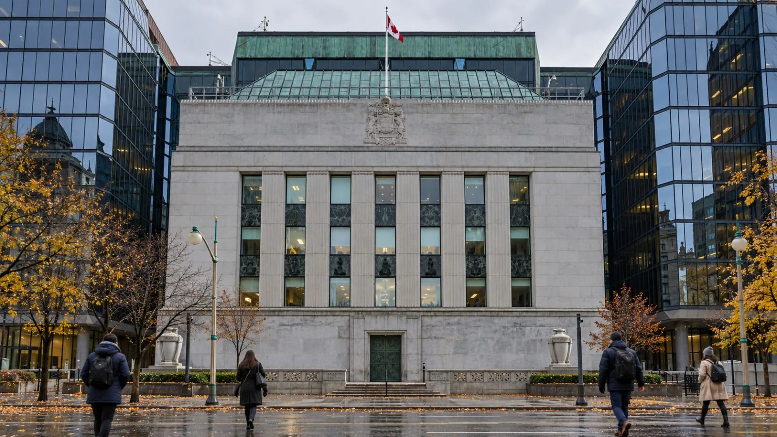 Pedestrians pass the Bank of Canada headquarters on Wellington Street in Ottawa. / EconoTimes.ai