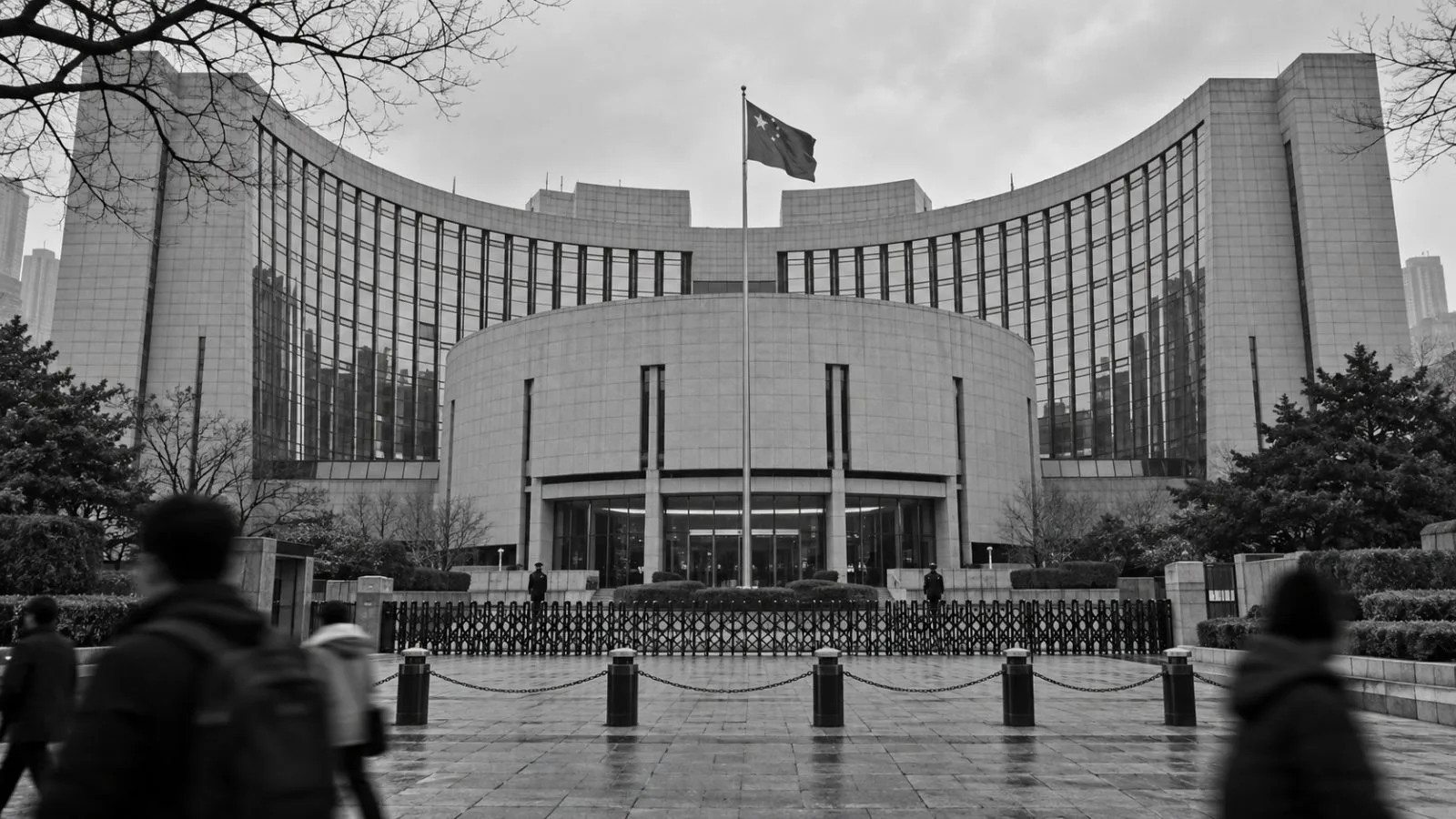 The People's Bank of China headquarters stands behind a security gate in Beijing. / EconoTimes.ai