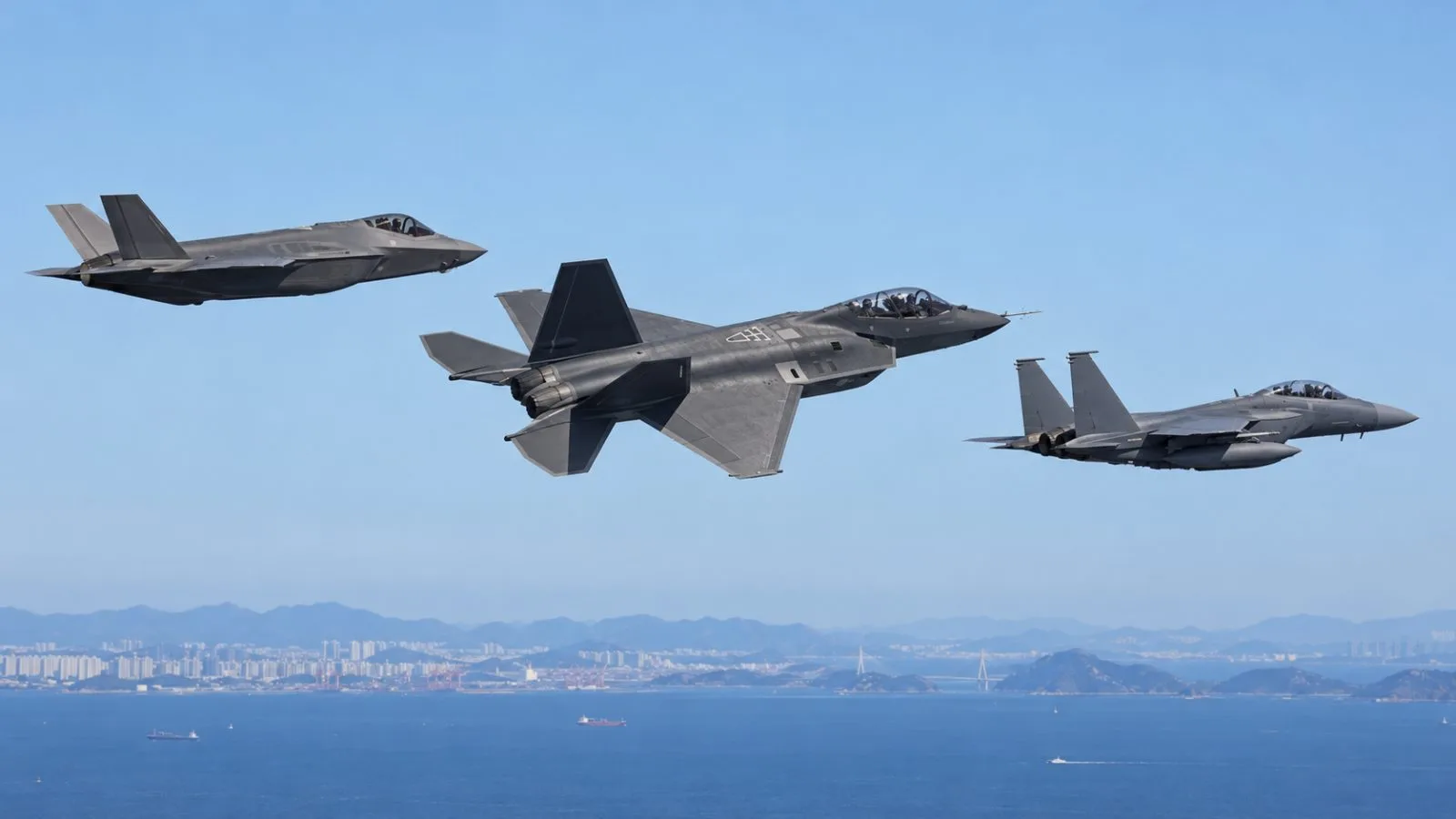 Military aircraft fly in formation over the Yellow Sea off Incheon, South Korea / EconoTimes.ai