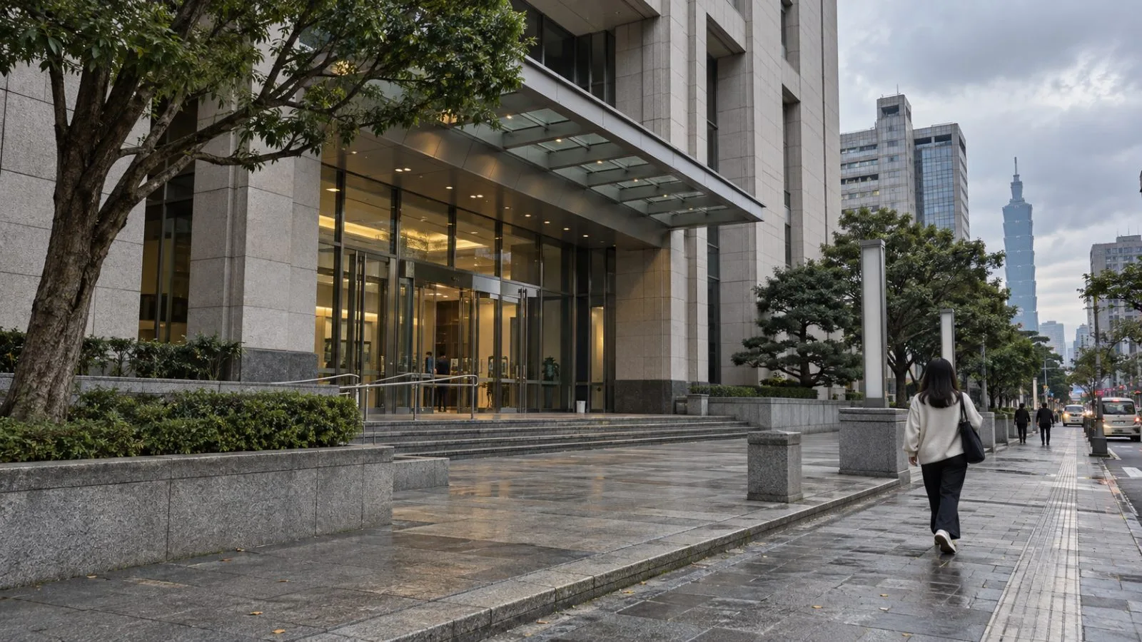 Taiwan's Mainland Affairs Council offices stand in Taipei beneath an overcast afternoon sky. (AI-generated image / EconoTimes)