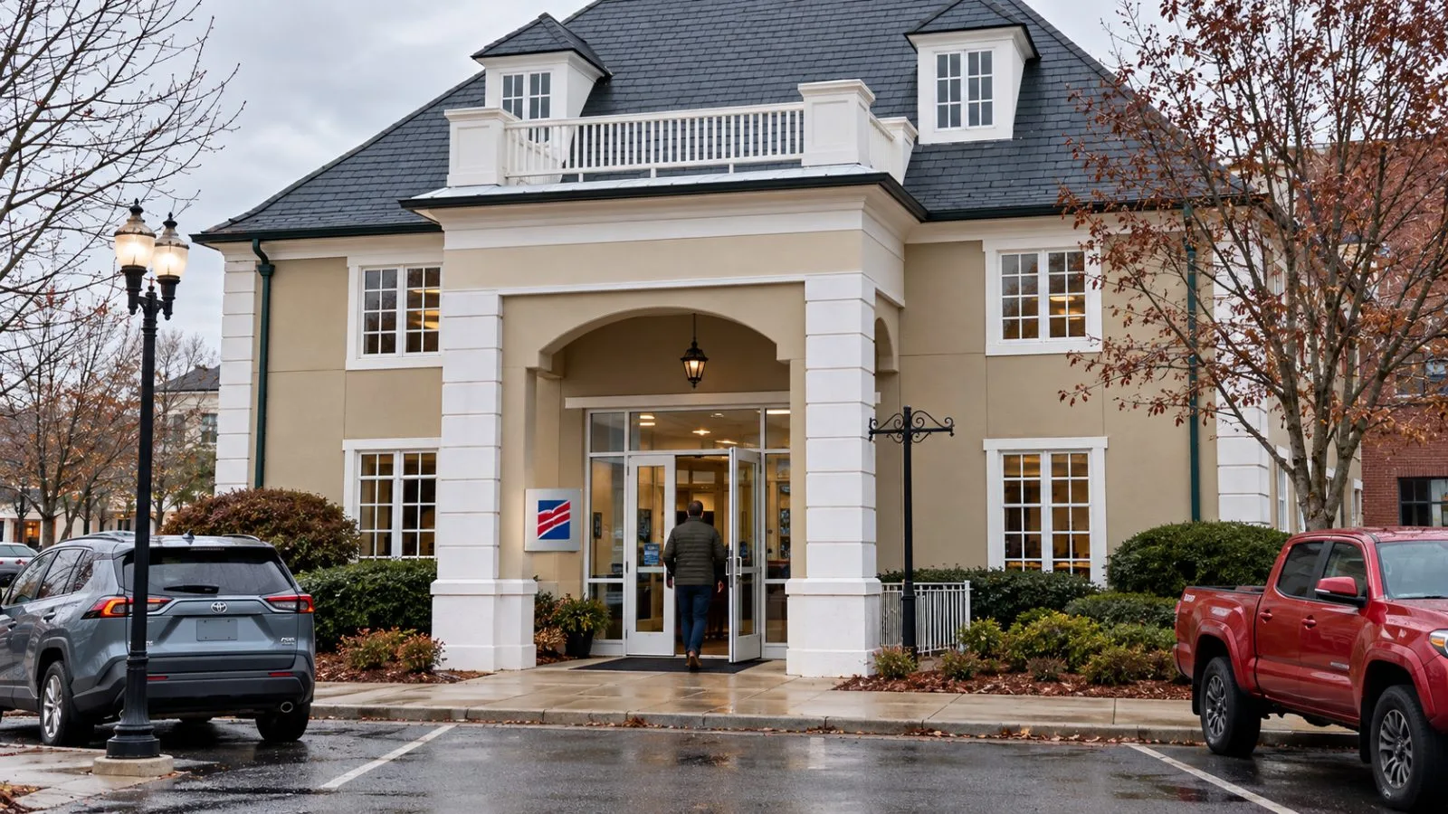 First Citizens BancShares’ headquarters stands beside a wet street in Raleigh, North Carolina. / EconoTimes.ai