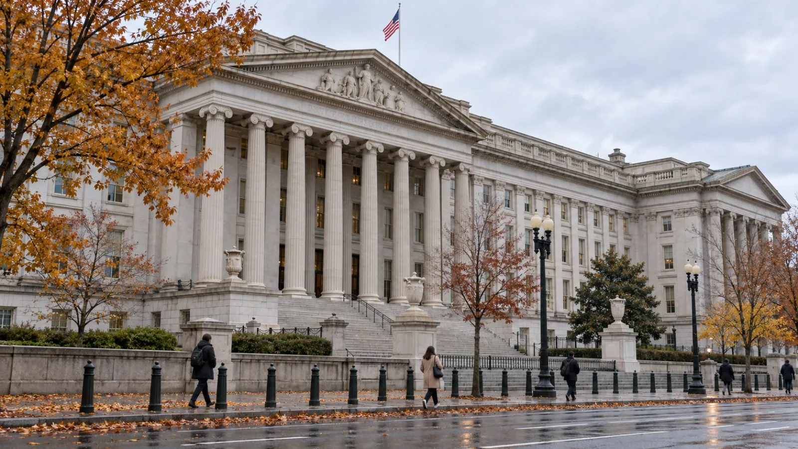 Pedestrians pass the U.S. Treasury building in Washington on an overcast morning / EconoTimes.ai