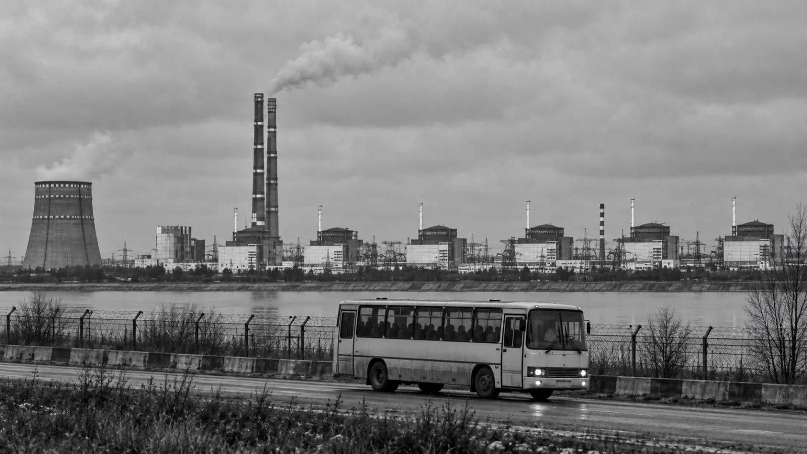 A bus travels near the Zaporizhzhia nuclear plant in Enerhodar, Ukraine. / EconoTimes.ai