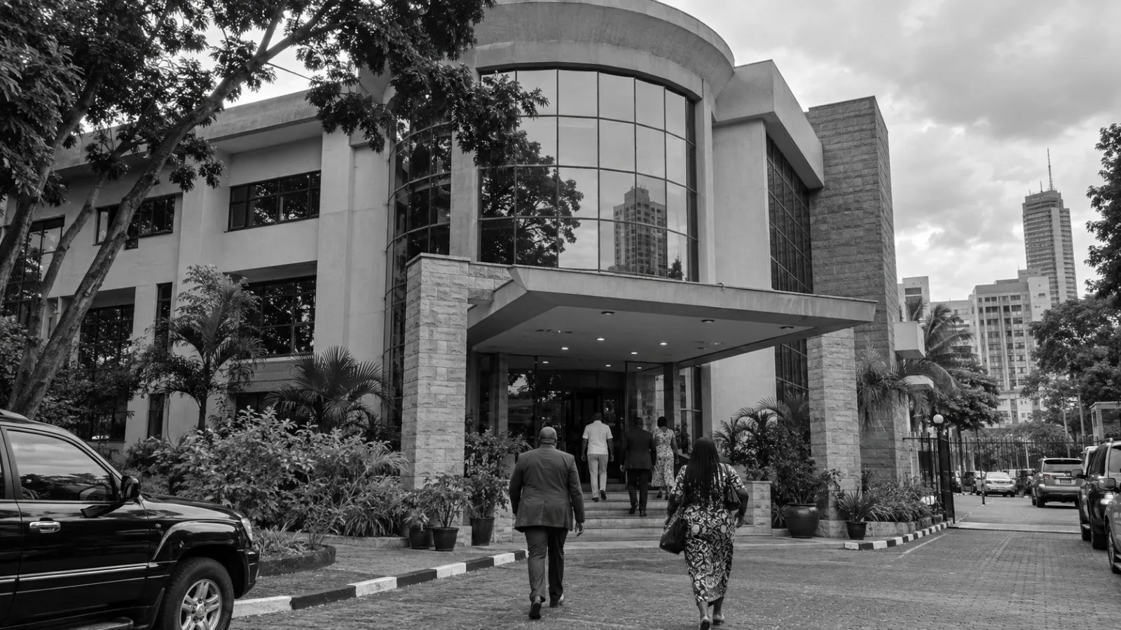 Visitors enter Chungwa House in Nairobi, Kenya, on an overcast afternoon. (AI-generated image / EconoTimes)