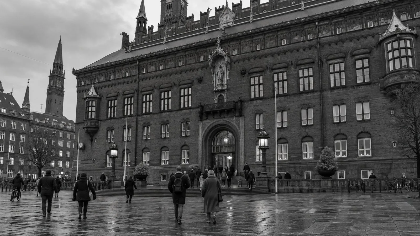 Residents approach Copenhagen City Hall on an overcast afternoon in Copenhagen, Denmark (AI-generated image / EconoTimes)