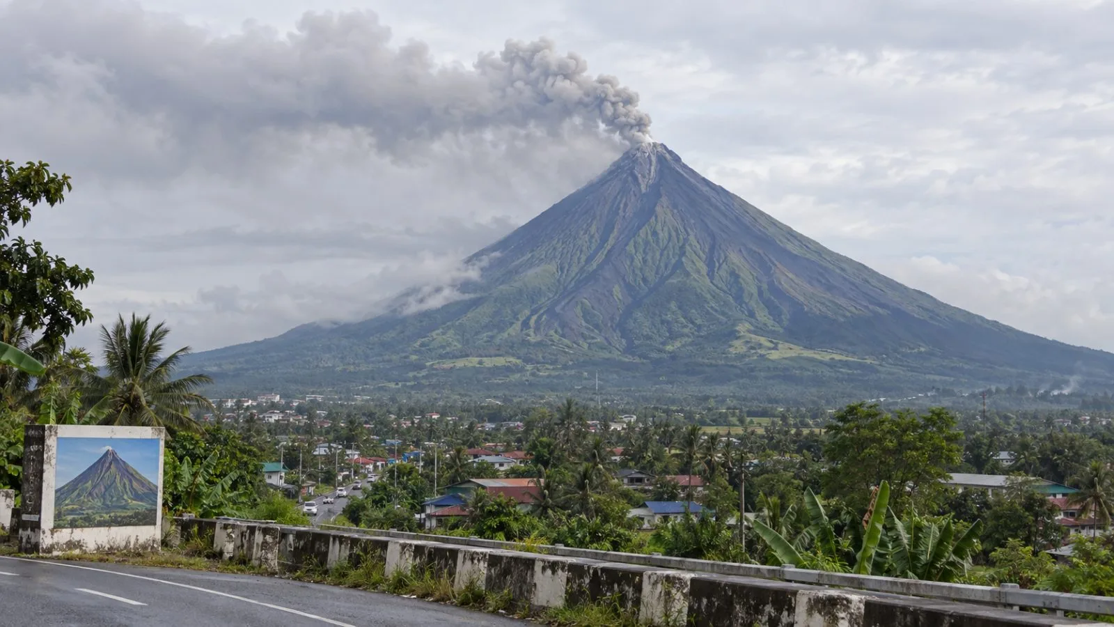 An ash plume rises above Mayon Volcano near Legazpi City, Albay, Philippines. / EconoTimes.ai